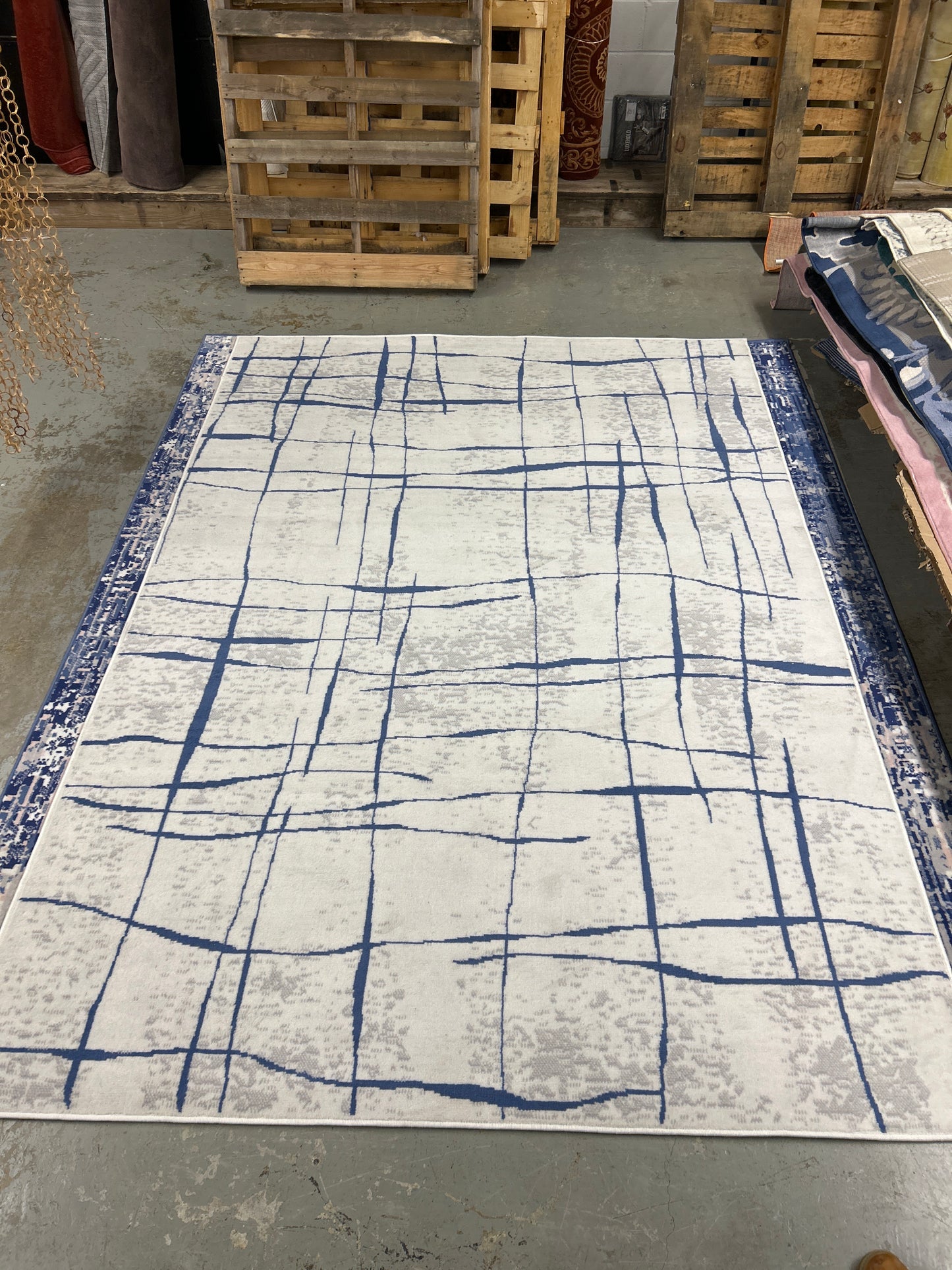 7 x 10 white and blue area rug, by Nourison Whimsical Collection