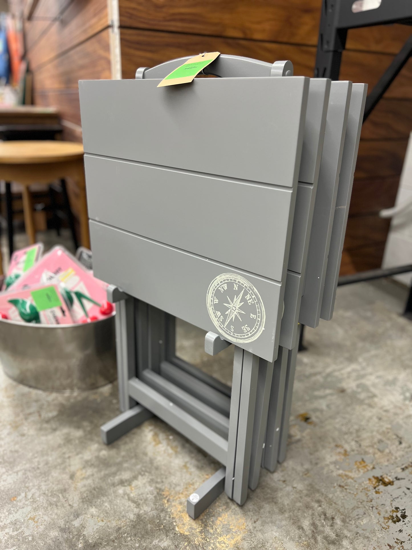 Linon 4pc 26.4" Compass Finish Plank Tray Tables with Storage Rack Dark Gray | Retail Price: $125.99