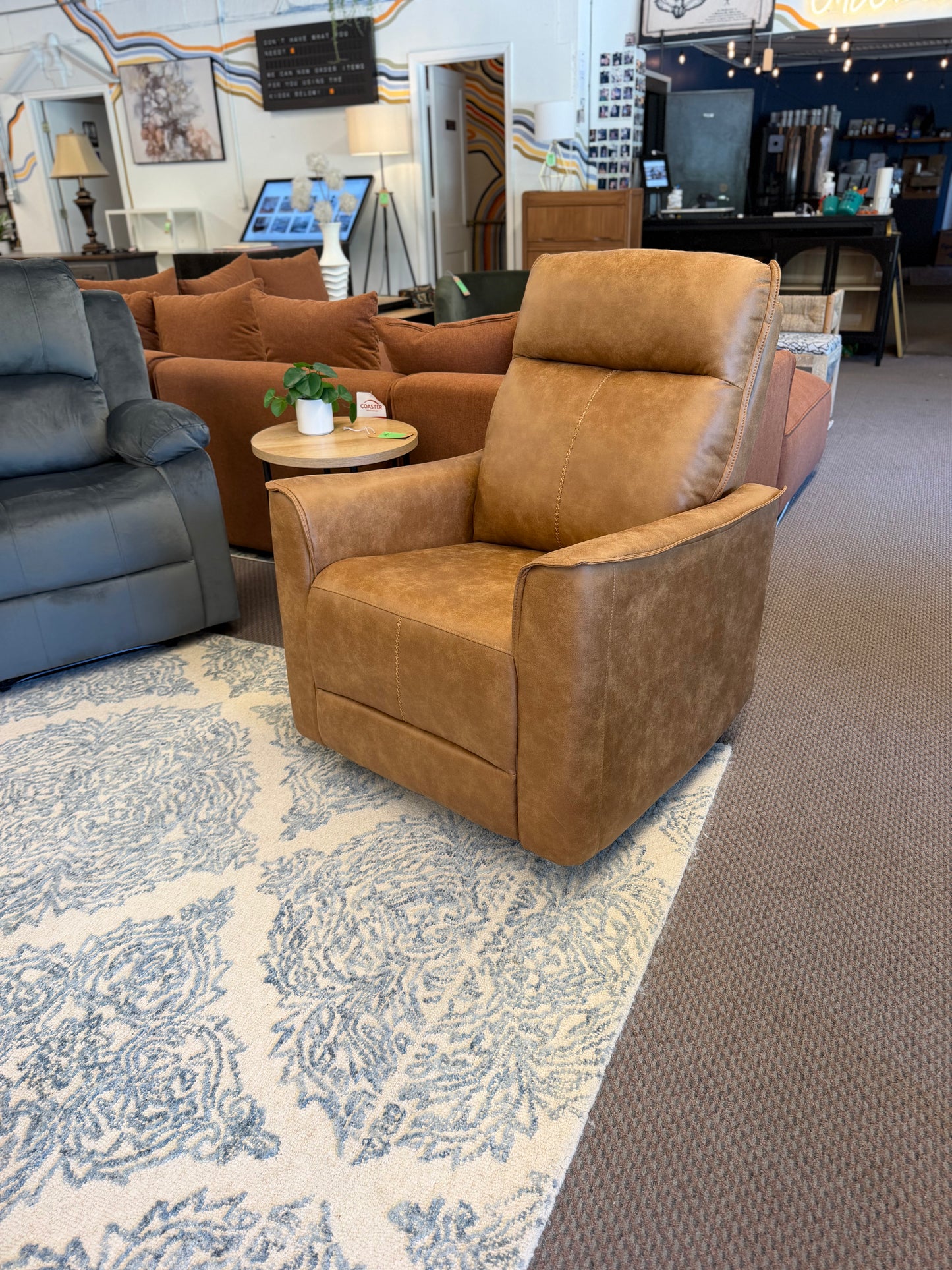 Manual Swivel Glider Recliner Retail: $329