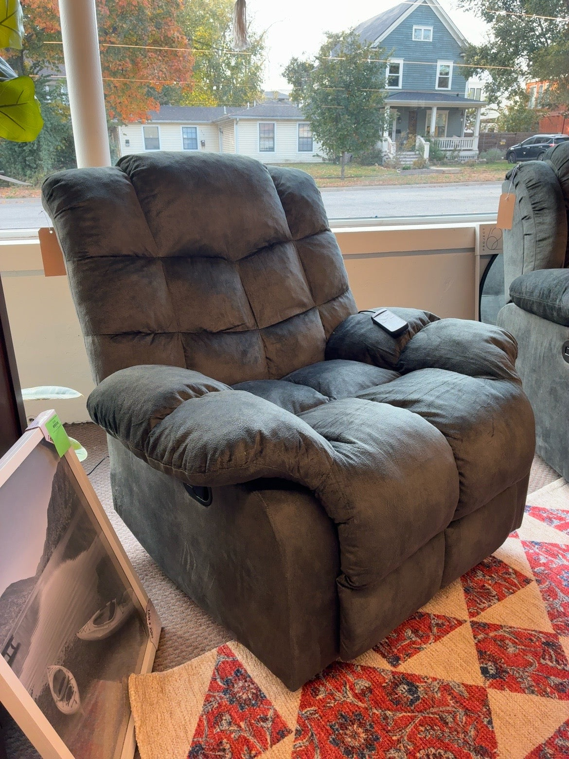Dark green overstuffed manual reclining upholstered chair