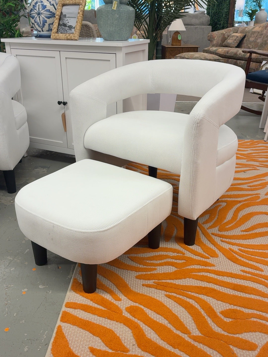 White chair with matching ottoman, minor stains, sold as is