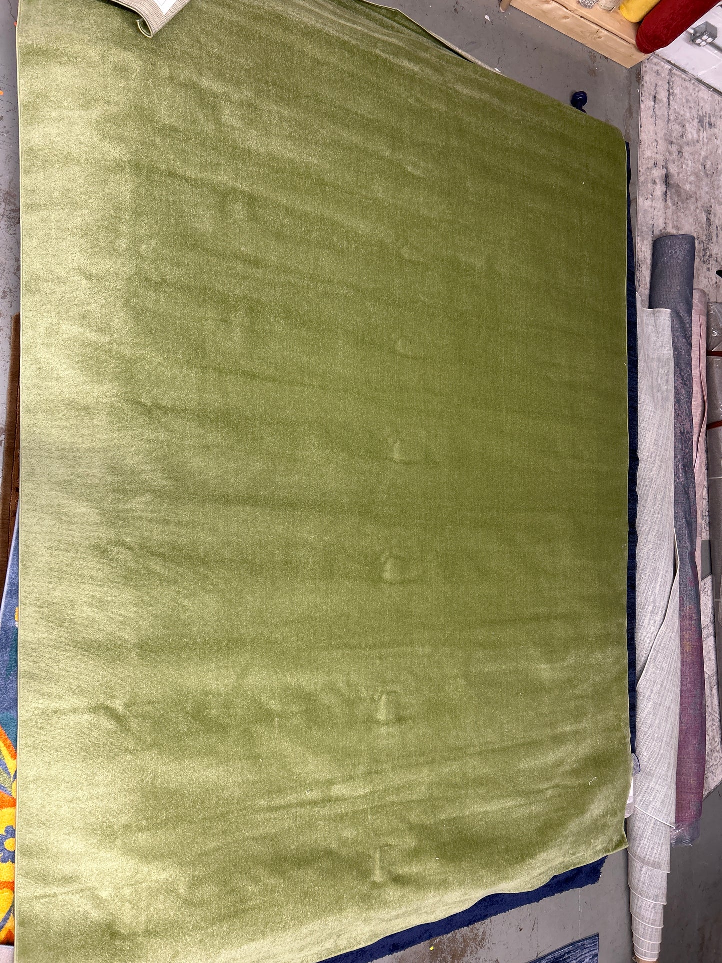 10 x 14 area rug (ID #: 14106) as is (minor flaw on one part of rug—see second image)