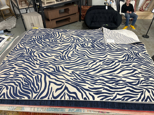 9 x 13 Nourison area rug - “blue stream”