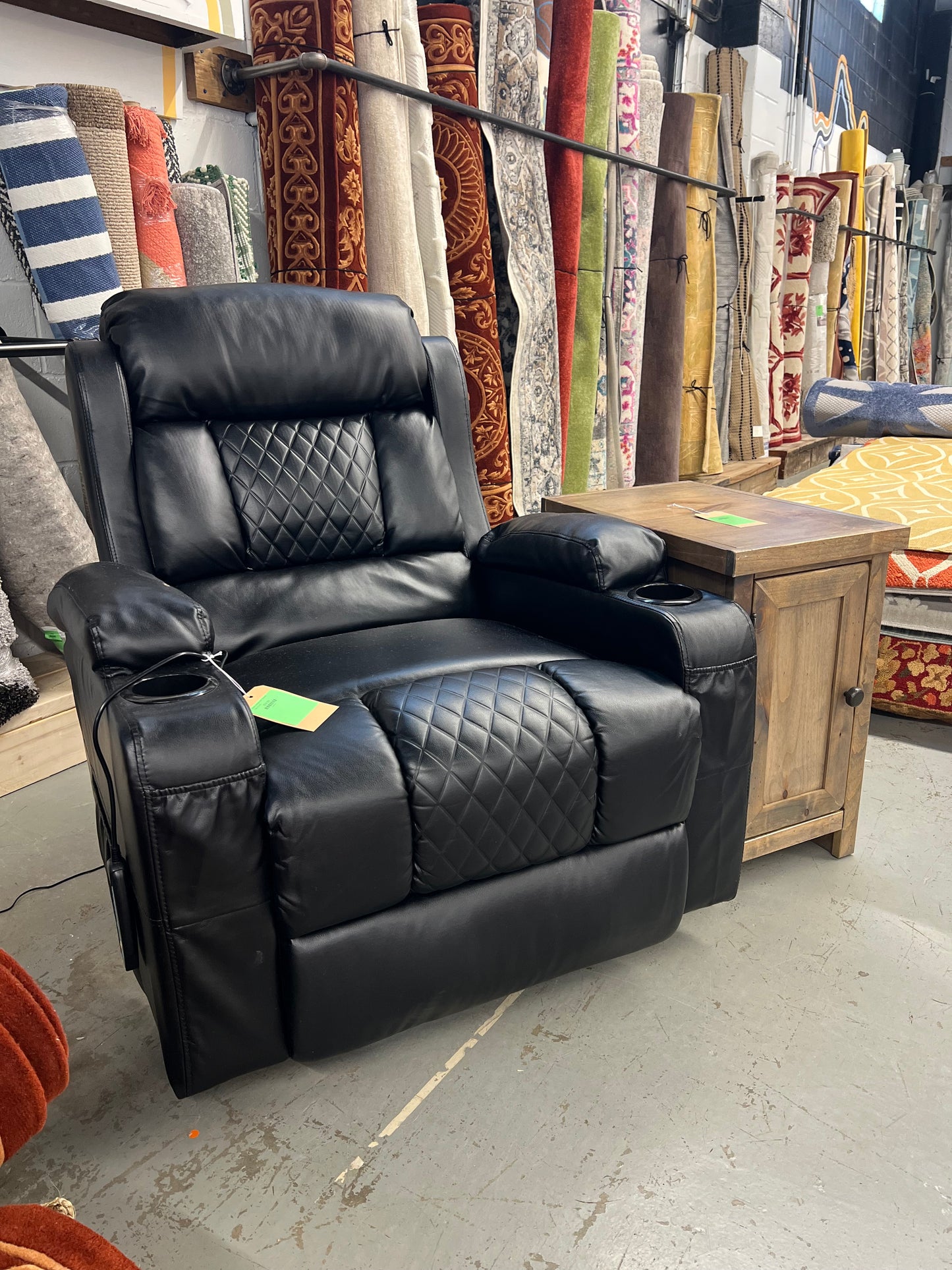 Black massage chair *donated Tear in Arm