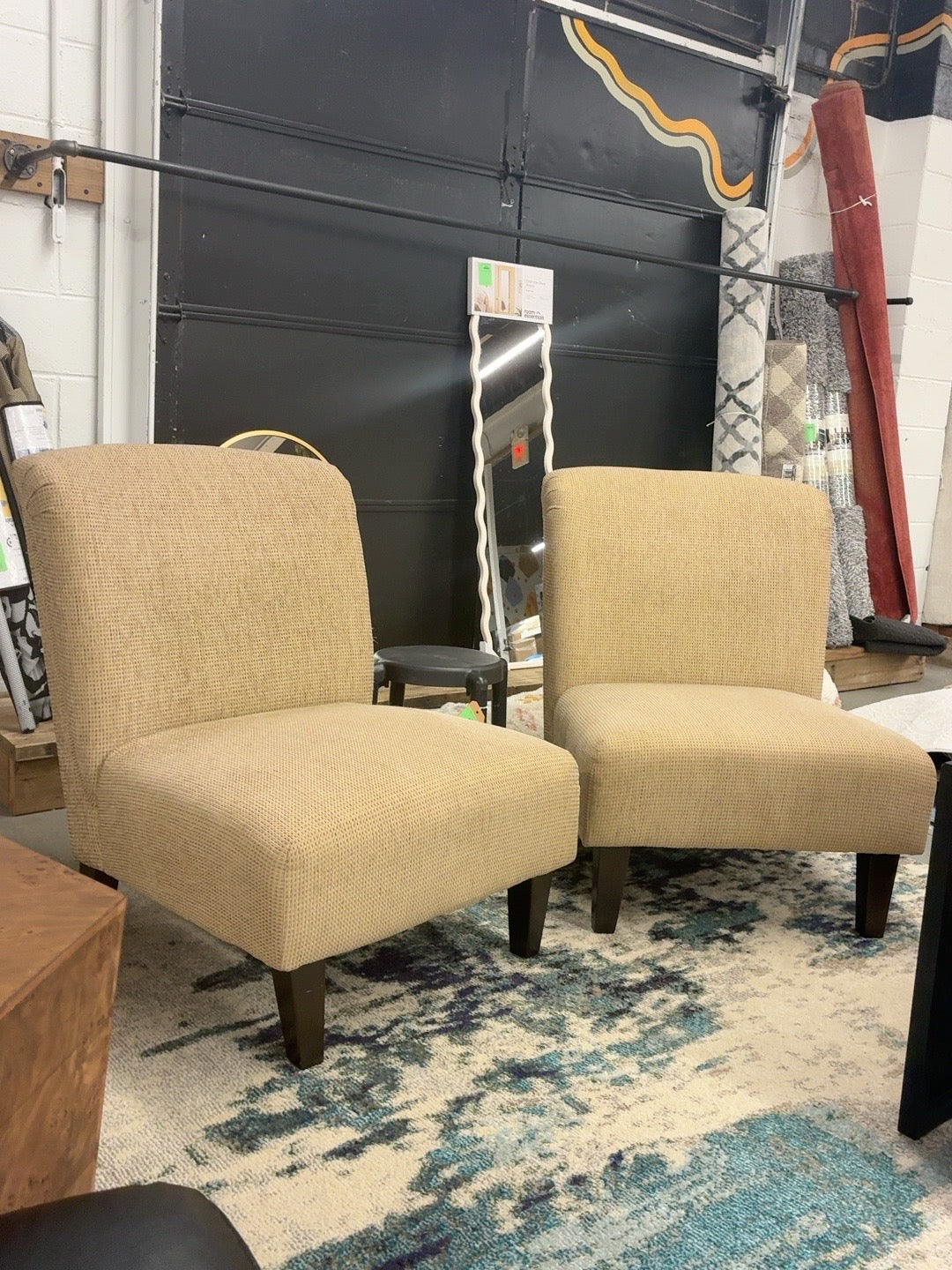 Pair of beige upholstered armless accent chairs