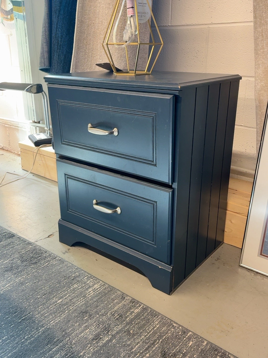 Navy blue two drawer cabinet in fair condition