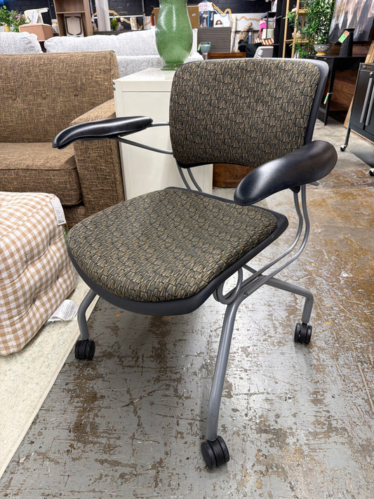 Patterned Rolling Arm Chair *donated