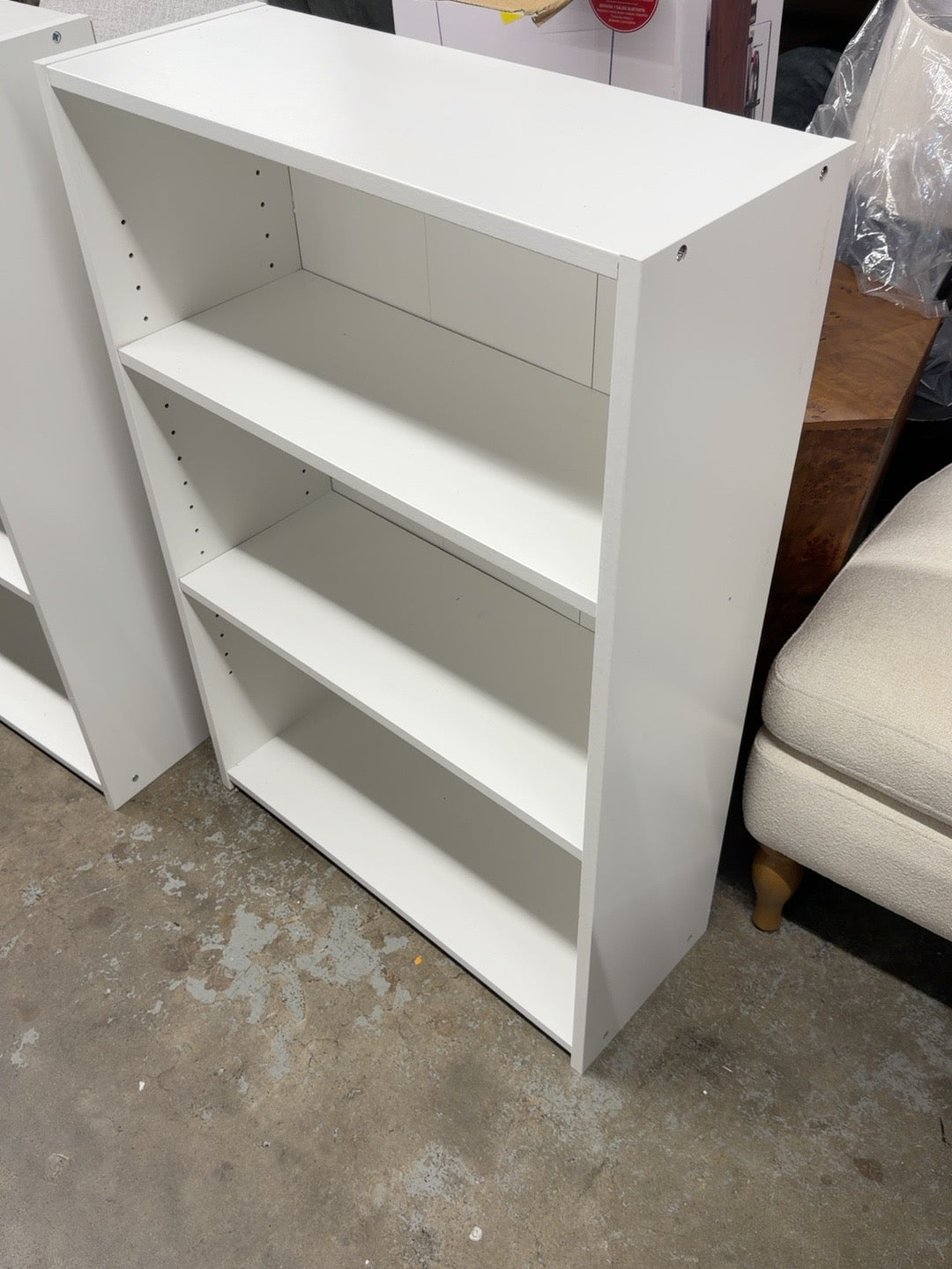 White assembled three-shelf bookcase photographed at Ready for Good; sold individually