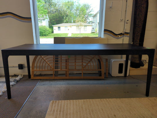 86.5 x 31 x 30 Black Woodgrain Table AS IS cosmetic dents on top