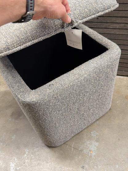 Open Threshold gray storage ottoman showing interior storage compartment