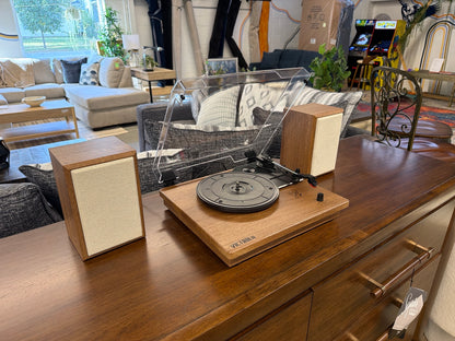 Victrola Kingfield oak finish turntable with two bookshelf speakers and clear dust cover